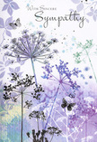This sympathy card unfolds like a quiet walk through one of Muswell Hill's hidden green corners at dusk. Across the card, fine silhouettes of wild umbelliferous blooms rise on threadlike stems, their forms poised and graceful. Each flower head opens into a subtle umbrella of tiny florets, brushed in layered tones of lavender, soft indigo, and cool blue, touched here and there with gentle silvery greens. The illustration is suffused with a soft watercolour wash that drifts behind the flowers, moving from pale violet to cloudy blue-grey, like the sky over Alexandra Palace as evening settles. Nothing is sharply defined; instead, edges dissolve into one another, giving the impression of a meadow half-seen through memory or mist. Faint hints of additional foliage and stems drift in the background, creating depth without clutter. Among the blooms, a pair of butterflies hovers, their translucent wings just outlined in lilac and blue, capturing a feeling of fragile, continuing life. Their presence suggests transformation and the quiet companionship of cherished memories. The overall palette is cool yet deeply comforting, with subtle gradients that soothe rather than startle. Light seems to fall evenly across the scene, as if filtered through soft cloud, lending the card an atmosphere of contemplation and peace. As a local florist, I can imagine this design resting beside a simple spray of white and lilac flowers at a Muswell Hill funeral or memorial. It feels like a gentle hand on the shoulder: understated, respectful, and grounded in the comforting language of nature, ideal for expressing sincere condolences when it is hard to find the right words.